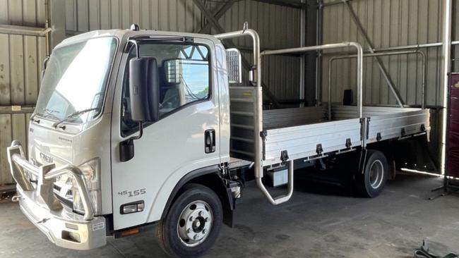 A 2021 model Isuzu light commercial vehicle will be sold at auction next Wednesday following the winding up of Cairns-based construction firm Sawcom. Picture: Quaid Auctioneers