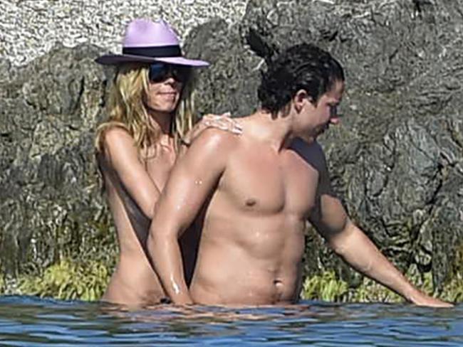 Heidi Klum Goes Fishing While Topless