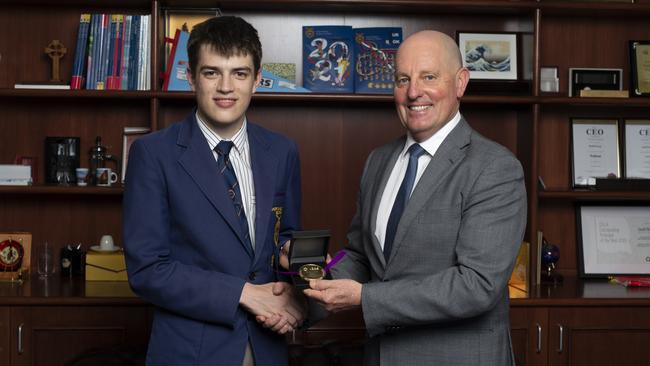 WestMAC's Felix Meier receiving ICAS medal from WestMAC Principal Mr Geoff McLay. Picture: Supplied