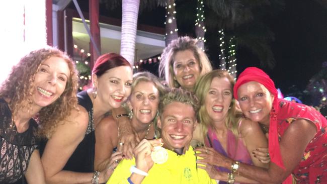 Commonwealth Games triathlon gold medalist Mathew Hauser poses with fans at the Star Casino on the Gold Coast.