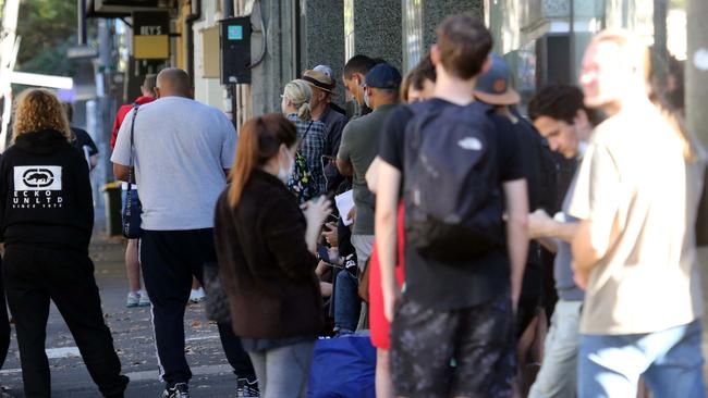 People queue outside the East Sydney Centrelink office earlier this week. Picture: Matrix