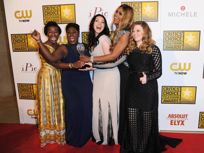 Stars ... from left, Uzo Aduba, Danielle Brooks, Laura Prepon, Laverne Cox, and Natasha Lyonne pose with the award for best comedy series for "Orange is the New Black" in the press room at the Critics' Choice Television Awards.