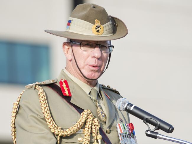 Briefing with figures given to General David Hurley. Photo: Courtesy of Australian Defence Force