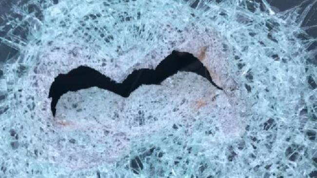 A smashed windscreen after a rock-throwing incident south of the Sherriffs Road on June 21, 2018. Picture: SAPOL.