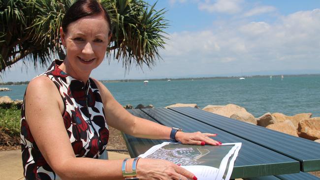 State Labor MP for Redcliffe Yvette D'Ath examines the map for the barge to Moreton Island landing site. Picture: Erin Smith.