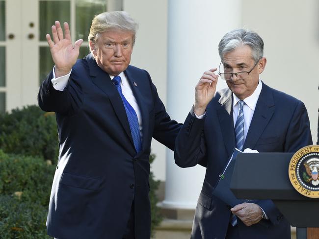(FILES) US President Donald Trump (L) signals the end of ceremony after announcing Jerome Powell (R) as nominee for Chairman of the Federal Reserve in the Rose Garden of the White House in Washington, DC, November 2, 2017. US President Donald Trump escalated his attacks on Federal Reserve chair Jerome Powell on April 21, 2025, berating the head of the fiercely independent central bank for not cutting interest rates -- days after threatening his job. Using a pejorative nickname for the powerful banker, Trump posted on social media that 