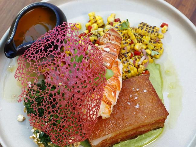 DAILY TELEGRAPH 30TH JUNE 2023Pictured at Bankstown Sports Club in Sydney is ÃLand & SeaÃ&#147; crispy pork belly, grilled lobster tail, broccoli lollipops, corn salsa, lobster sauce & red coral tuile prepared by chef Daniel Tran for the ClubsNSW Perfect Plate Awards.Picture: Richard Dobson