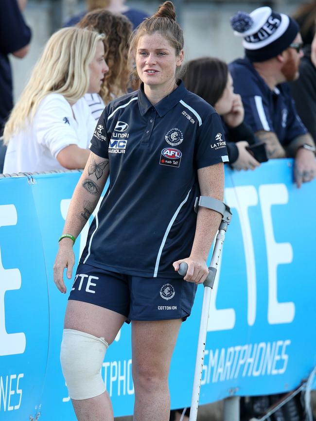Injured Carlton captain Bri Davey walks the boundary line. Picture: Michael Klein