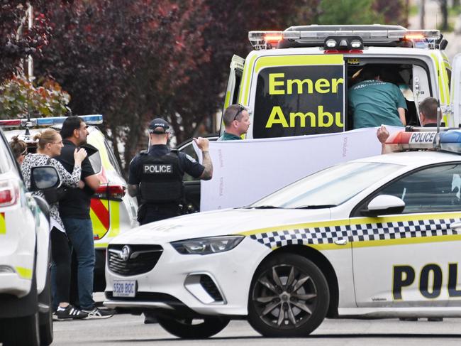 OCTOBER 7, 2024: Family members with paramedics after child with burns is loaded onto an ambulance in Jenkins Ave, Rostrevor. Picture: Brenton Edwards