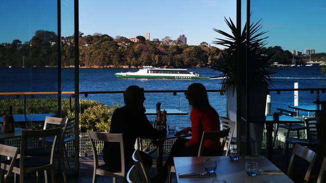 Diners enjoy water views from the Deckhouse cafe at Woolwich Pier. Picture: Toby Zerna