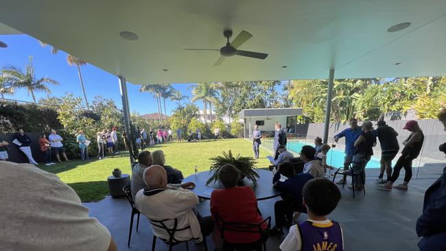 A large crowd turned out for the record breaking auction at 61 Goodwood St, Hendra Photo: David Bonaddio