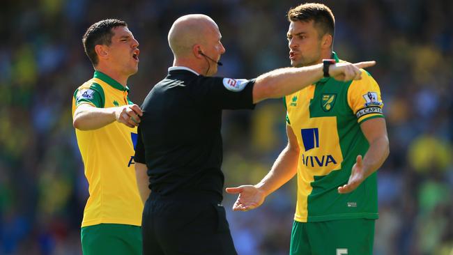 Norwich City players appeal to referee Simon Hooper after an equalising goal was disallowed.