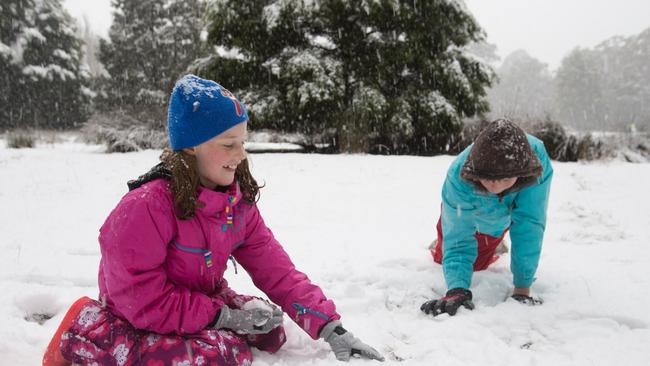 Rachel and Jemma Power of Mt Field enjoy the snow on August 3rd 2015. Hobart Snow DVG Mt Field National Park. Pic supplied by Rachel Power