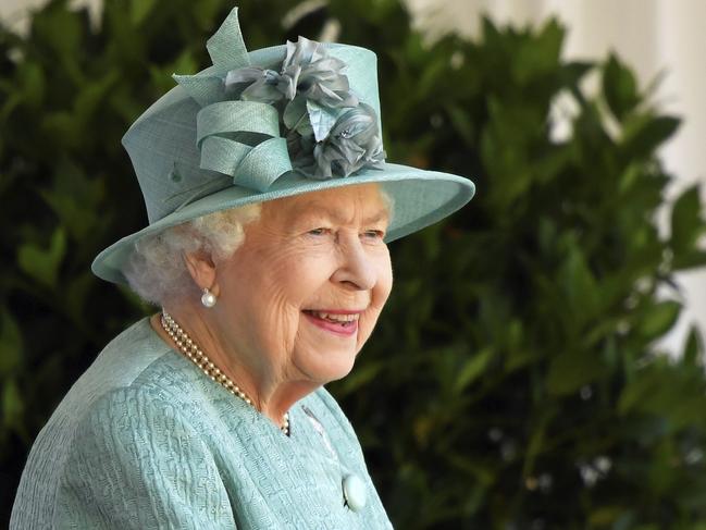 Britain's Queen Elizabeth II reacts as she looks out during a ceremony to mark her official birthday at Windsor Castle in Windsor, England. Picture: AP