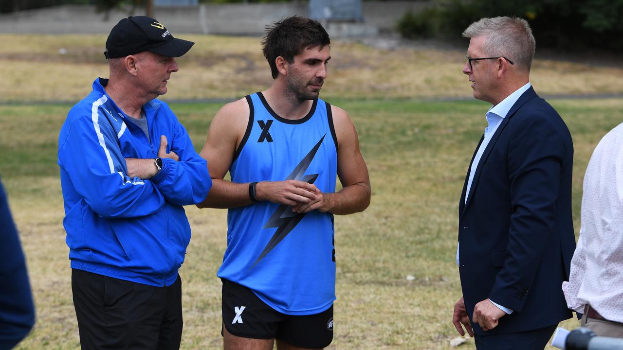 Andrew Gaff, centre, of the Bolts speaks with AFL football operations boss Steve Hocking at AFLX training session last month. Picture: AAP Image/James Ross