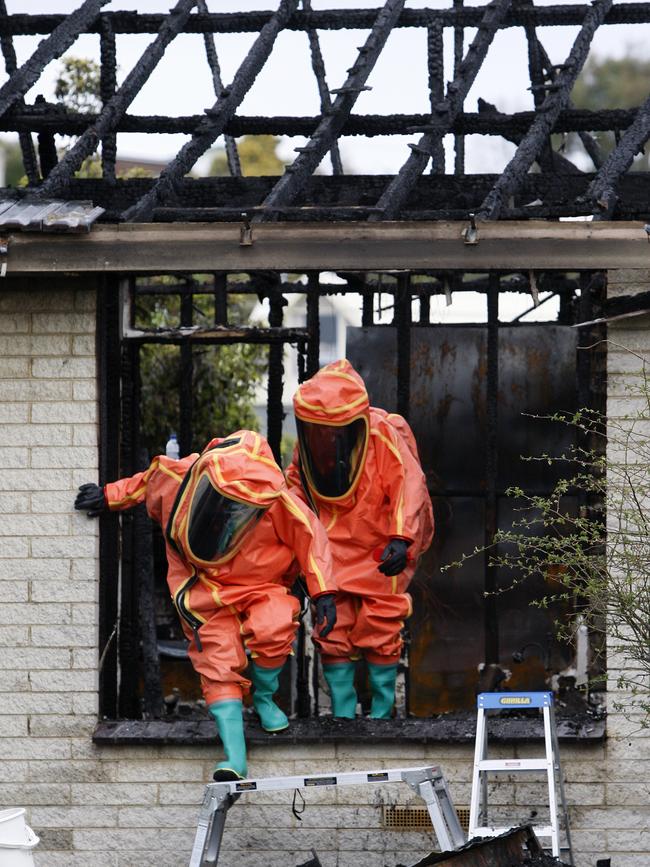 Tasmania Fire Service Hazmat investigators at the site, after chemicals were found on the property.