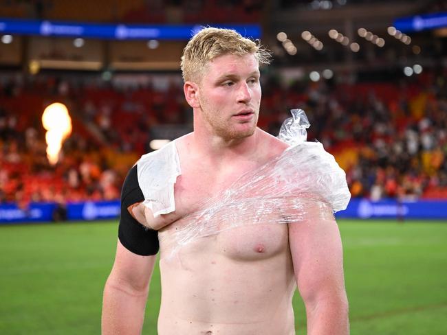 Prop Thomas Flegler ices his injured shoulder after the Dolphins v Tigers clash at Suncorp Stadium. Picture: NRL Images