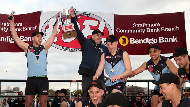 Aberfeldie captain Luke Davis and coach Adam Potter show off the silverware in 2018. Picture: Mark Dadswell