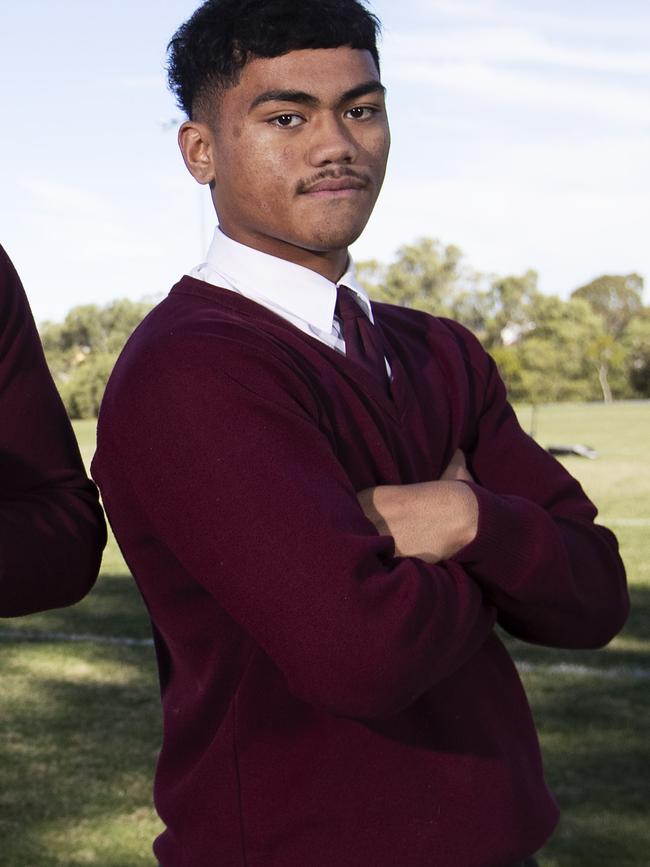 Karl Oloapu posing at Wavell SHS. (News Corp/Attila Csaszar)