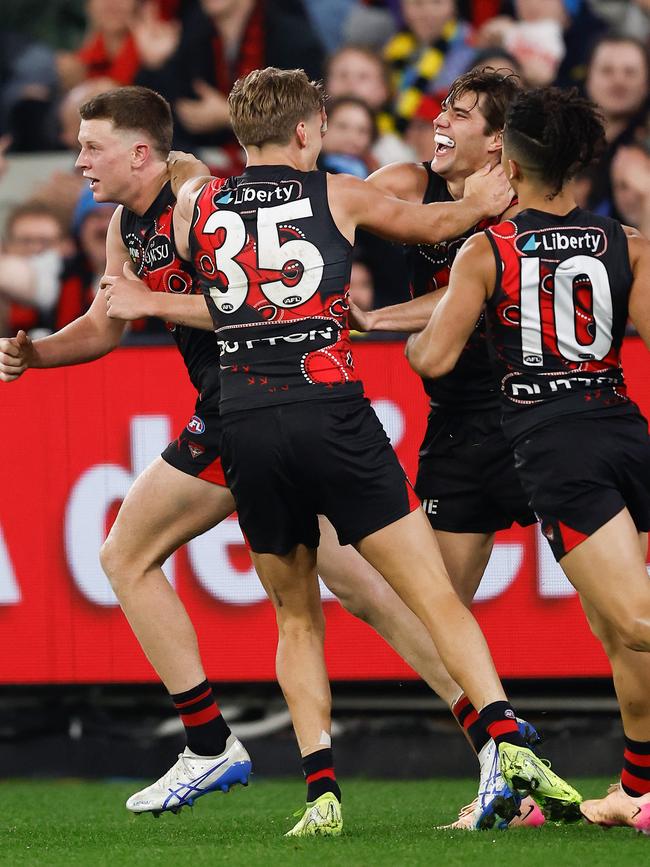 Essendon debutant Angus Clarke enjoys one of his three first-half goals.