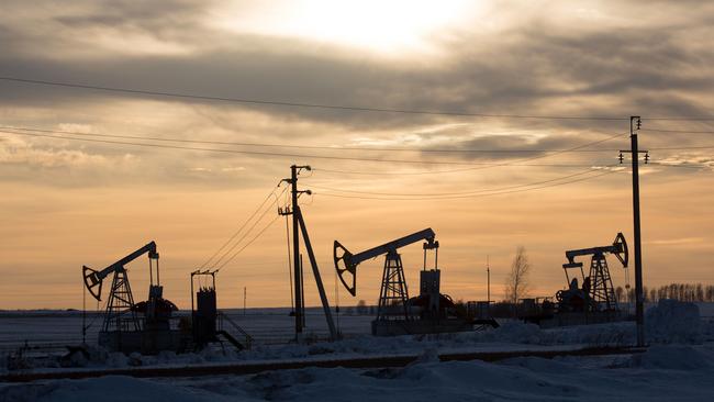 Oil pumping jacks, also known as "nodding donkeys", operate in an oilfield near Almetyevsk, Tatarstan, Russia.