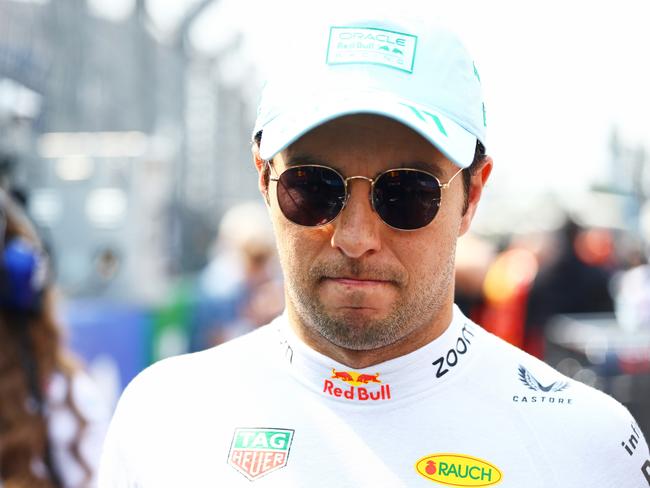 MEXICO CITY, MEXICO - OCTOBER 27: Sergio Perez of Mexico and Oracle Red Bull Racing looks on, on the grid prior to the F1 Grand Prix of Mexico at Autodromo Hermanos Rodriguez on October 27, 2024 in Mexico City, Mexico. (Photo by Mark Thompson/Getty Images)