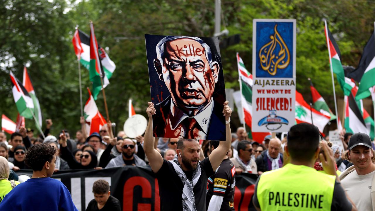 Protesters march in the Sydney CBD to call for peace and an end to the current Israeli occupation of Palestine and the ongoing war between the two nations. Picture: NewsWire / Damian Shaw