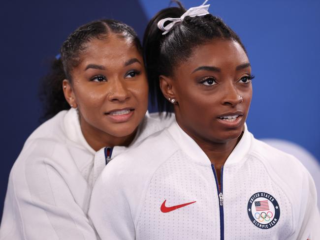 Jordan Chiles and Simone Biles of Team United States react during the Women's Team Final on day four of the Tokyo 2020 Olympic Games.