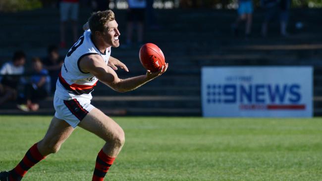 Rostrevor Old Collegians veteran Michael Coad in action during the 2018 division one grand final against Tea Tree Gully. Coad kicked six goals in the round nine clash against Brighton on Saturday. Picture: Brenton Edwards