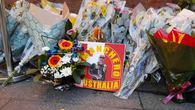 Flowers at the scene of the killing of Canberra Comanchero boss Pitasoni Ulavalu. Picture: Craig Dunlop