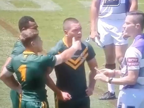 Reece Walsh demonstrating with the referee during a Junior Kangaroos game in 2019.