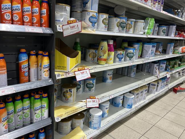 Panic buying at Rami Levy supermarket in Tel Aviv which has run out of water and is running low on baby supplies. Picture: Danielle Gusmaroli