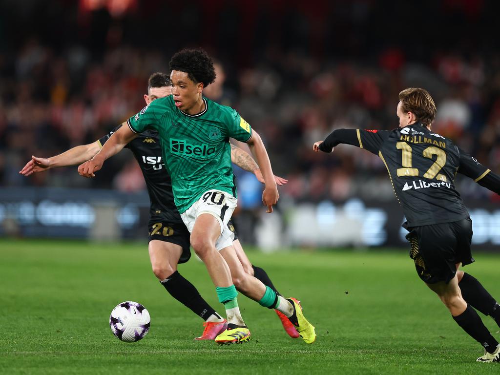 Newcastle United’s Travis Hernes holds possession in traffic. Picture: Getty Images