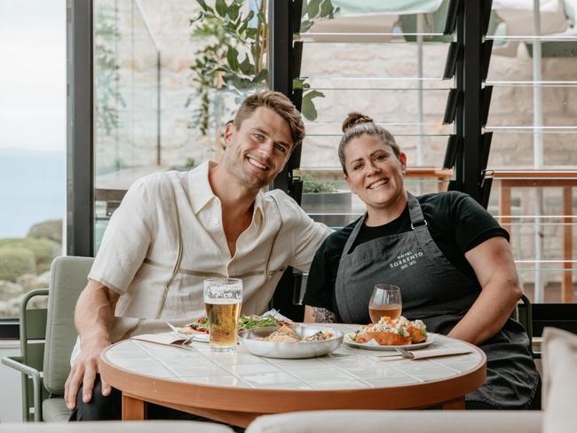 Hotel Sorrento is launching a new rooftop in time for the summer season. Hotel Sorento director Myles Pitt and executive chef Beth Pitt raise a glass to good times. Picture: Kate Shanasy