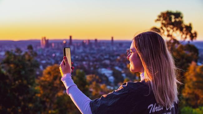 Annika Jones from Carindale enjoying the sunset at Mt Gravatt Outlook. Picture: Richard Walker