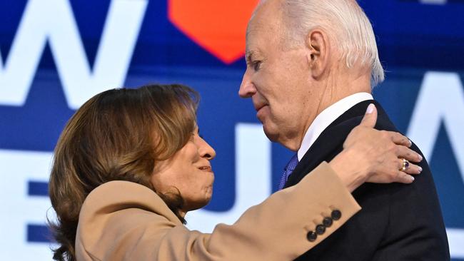 Joe Biden handed the torch to Kamala Harris. Picture: AFP.