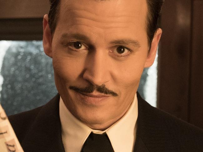 Johnny Depp as Ratchett in a scene from Twentieth Century Fox's film Murder on the Orient Express.