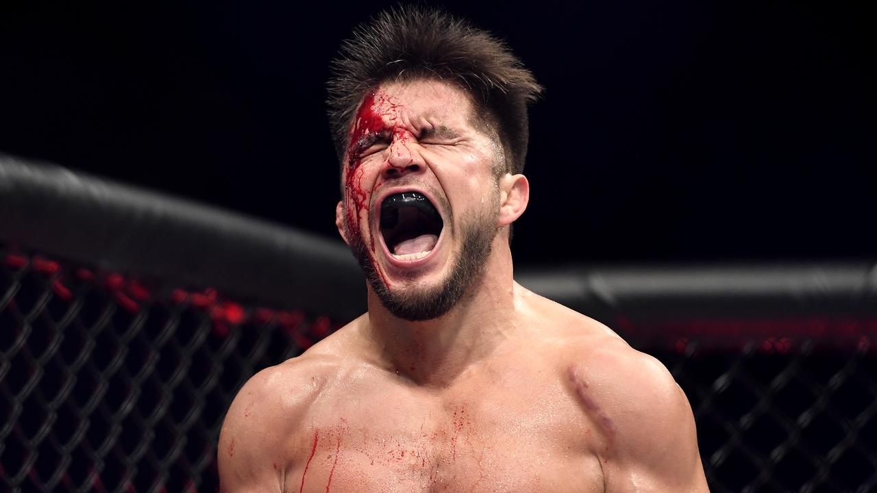 JACKSONVILLE, FLORIDA – MAY 09: Henry Cejudo of the United States celebrates after defeating Dominick Cruz of the United States in their bantamweight title fight during UFC 249 at VyStar Veterans Memorial Arena on May 09, 2020 in Jacksonville, Florida. (Photo by Douglas P. DeFelice/Getty Images)