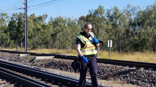 Emergency services at the scene of a train collision at Westwood, west of Rockhampton, on June 18, 2021.