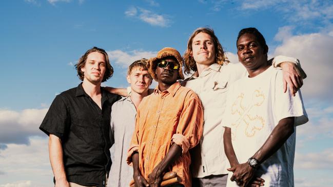 King Stingray ahead of the release of its debut album in August 2022. L-R: Lewis Stiles (drums), Campbell Messer (bass/vocals), Yirrnga Yunupingu (vocals), Roy Kellaway (guitar/vocals) and Dimathaya Burarrwanga (guitar/vocals/didgeridoo). Picture: Luke Henery