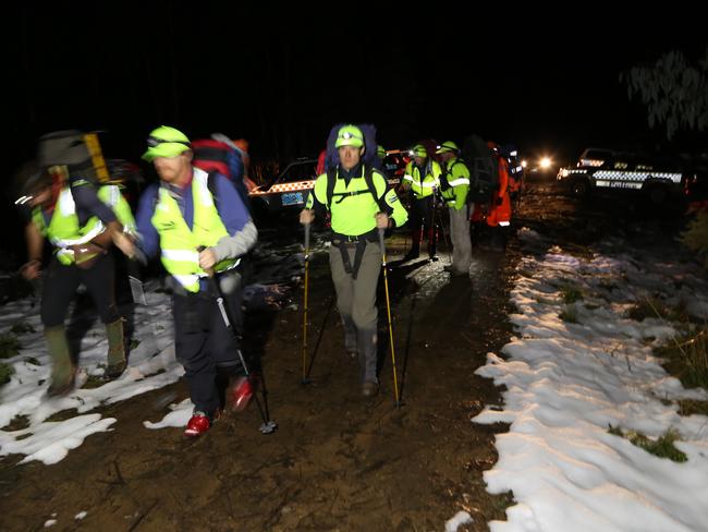 Emergency services embark on a search of Mt Bogong for two missing back country snowboarders. Picture: Simon Dallinger