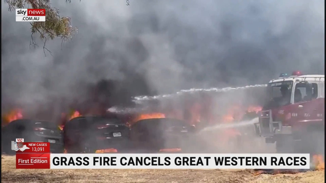 Several vehicles destroyed amid grass fire at Victorian racecourse