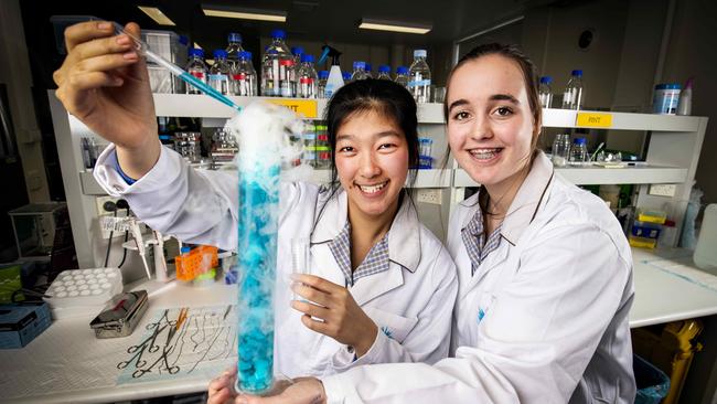 STEM Students Emma Nguyen and Tara Stewardson, with A/Prof Rachael Richardson, Principal Research Fellow, and Dr Sophie Payne (black dress), Research Fellow, at a Daly Wing laboratory at St Vincents Hospital. Picture- Nicole Cleary