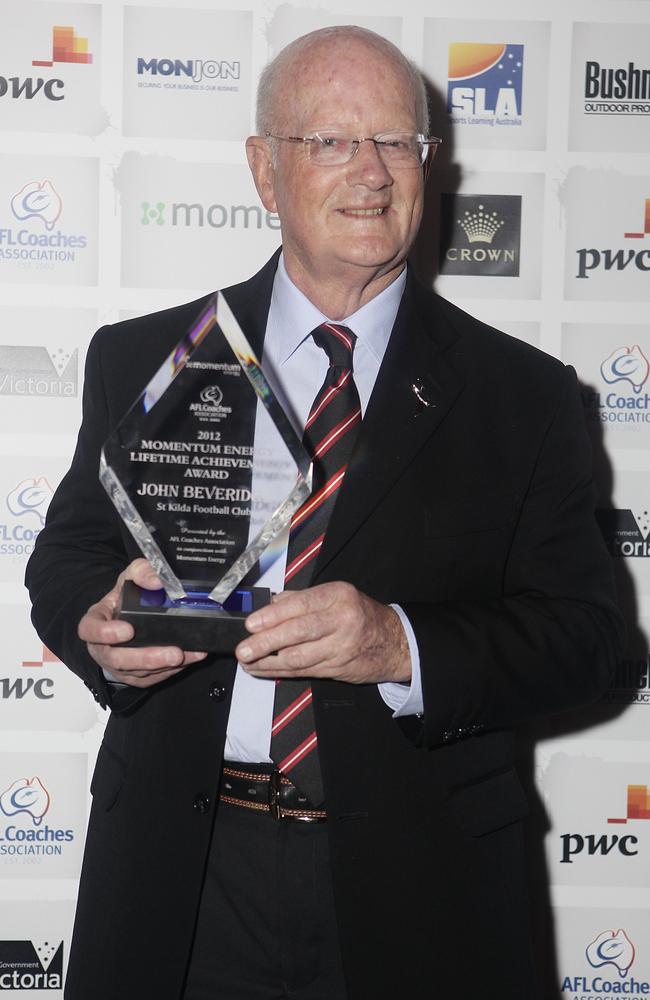 Beveridge with a lifetime achievement award he received in 2012.