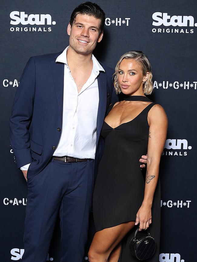 Matt Zukowski and Tammy Hembrow attend the global premiere of C*A*U*G*H*T at Sydney Opera House.