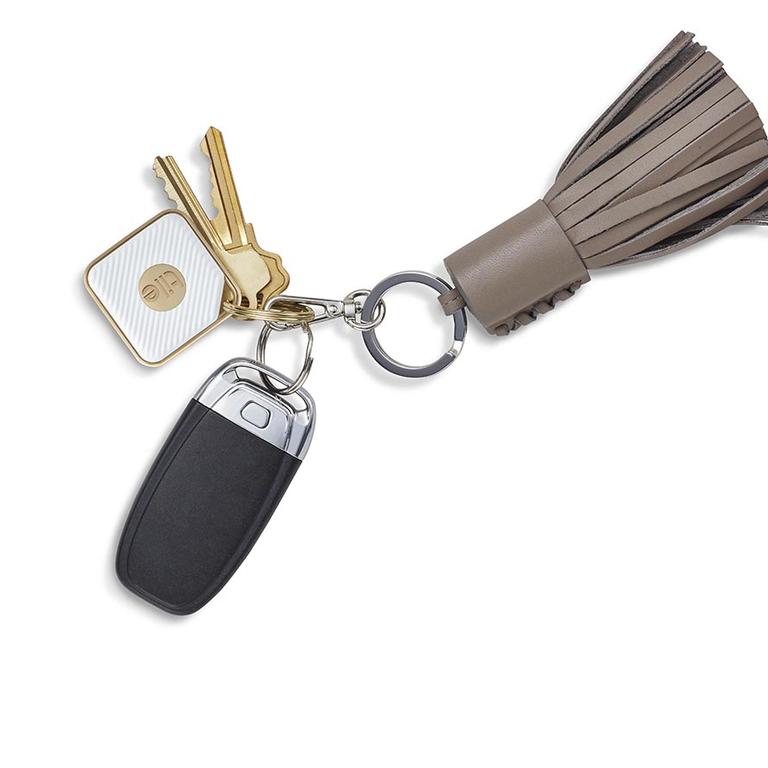 The Tile Bluetooth tracker on a set of car keys.