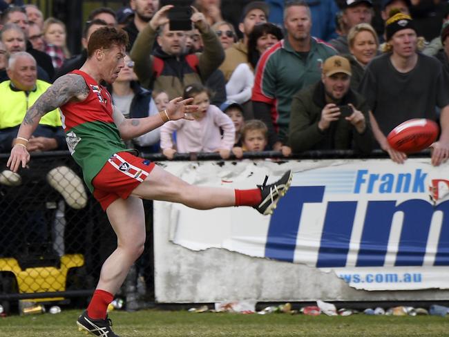 Aaron Ludewig kicks the winning point after the siren in the 2018 MPNFL Division 1 grand final, beating Sorrento. Picture: Andy Brownbill