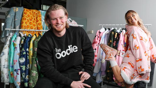 Davie Fogarty is behind brands such as the Oodie, through his company, The Davie group. Pictured with social media manager Linda Huynh. Picture: Sarah Reed