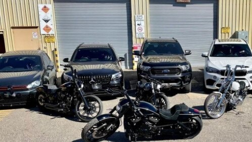 Five vehicles, as well as four Harley Davidson motorcycles and a jet ski, were seized in the raids. Picture: SA Police