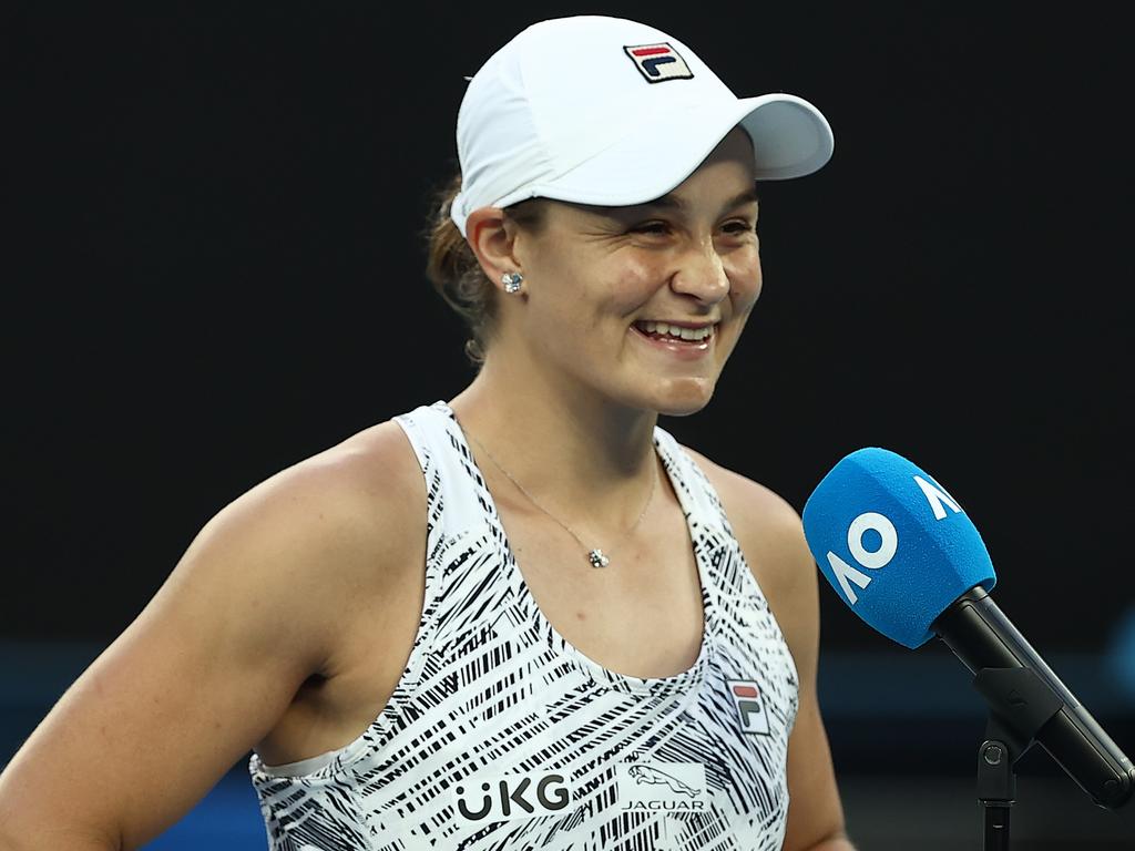 MELBOURNE, AUSTRALIA - JANUARY 17: Ashleigh Barty of Australia is interviewed on court after winning her first round singles match against Lesia Tsurenko of Ukraine during day one of the 2022 Australian Open at Melbourne Park on January 17, 2022 in Melbourne, Australia. (Photo by Cameron Spencer/Getty Images)